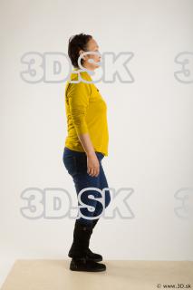 Walking reference of yellow sweater blue jeans Gwendolyn 0008